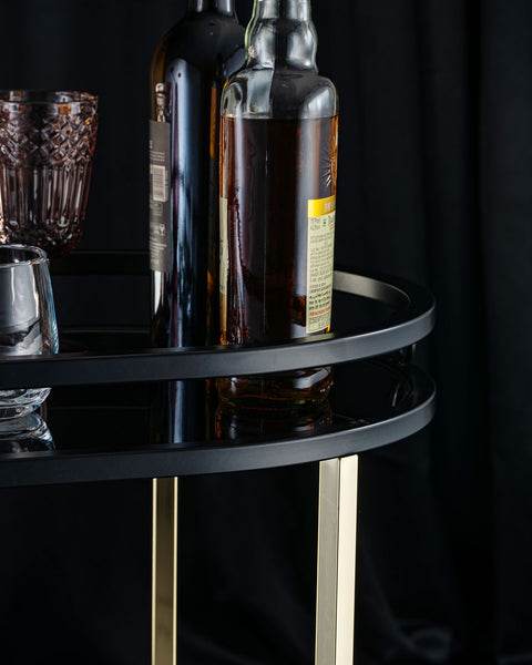 Sleek Black Serving Cart With Gold Trim